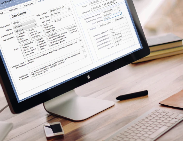 Job details screen of a phone repair tracking system, shown on a desktop monitor